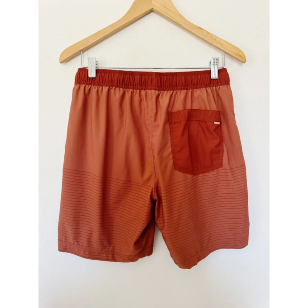 Vuori Orange Athletic Shorts with Cream Drawstring